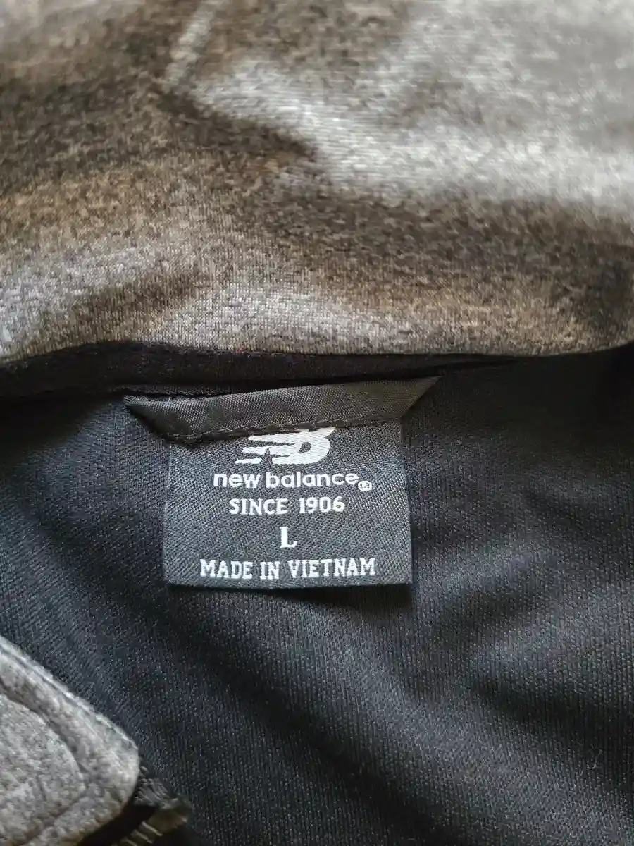 NEW BALANCE Trainingsjacke Bild 5